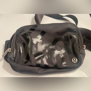 lululemon Everywhere RARE FIND - WOBBLY WORDMARK 2L Black Logo Belt Bag